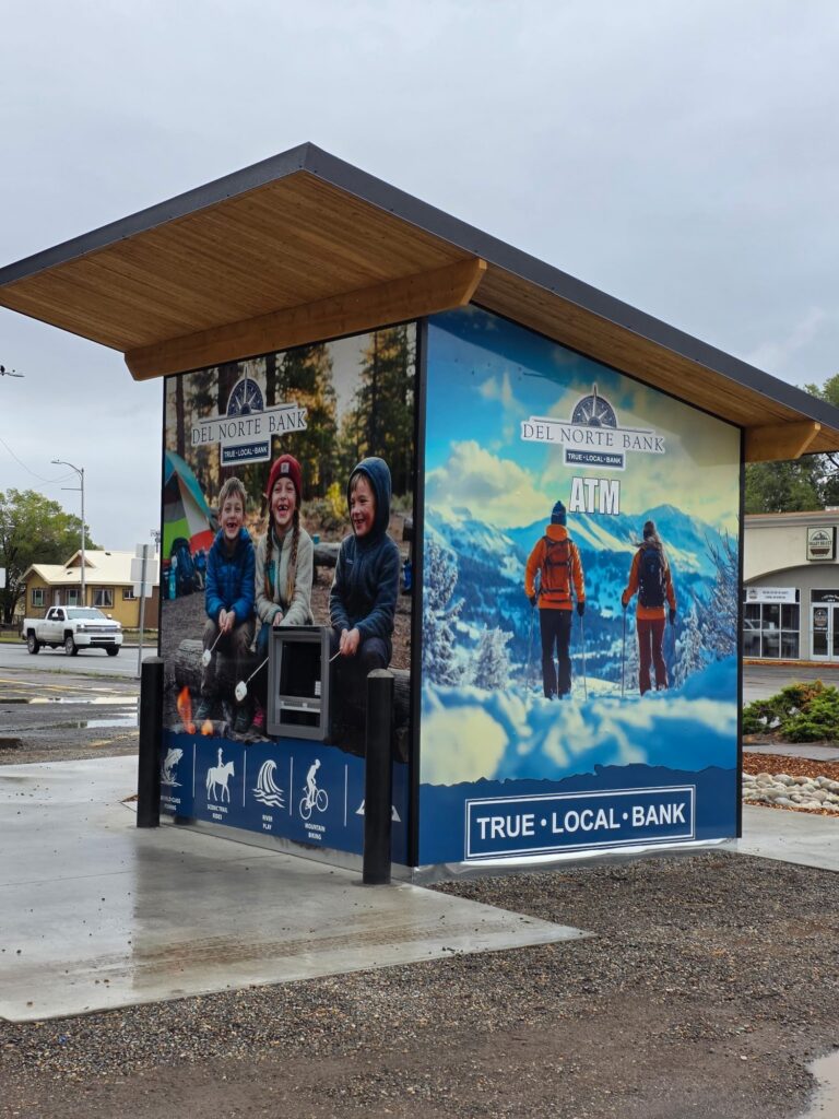 Full-color printed graphics wrapping the Del Norte Bank ATM kiosk