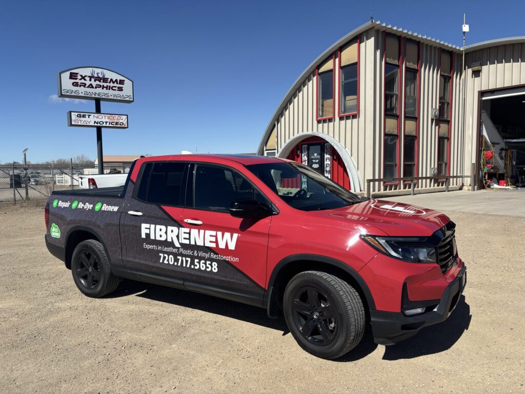 Partial wrap on a Honda Ridgeline for Fibrenew, parked at Extreme Graphics
