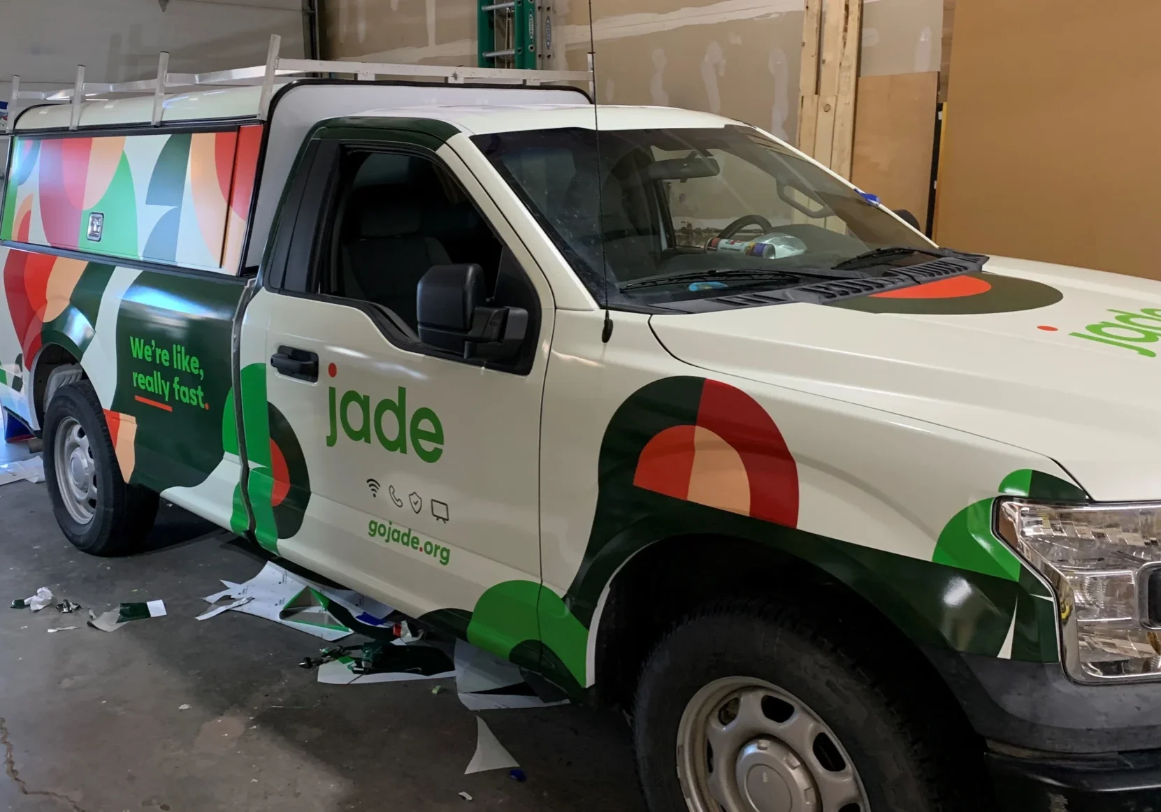 Vehicle wrap for a white pickup truck for Jade